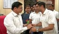 NGO workers thank bank employees with flowers for their efforts during demonetisation 