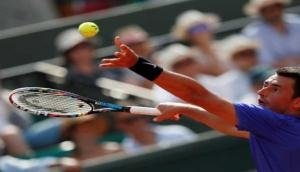 Tomic's father 'ashamed' of his son's Wimbledon antics