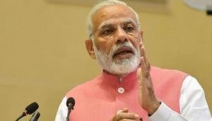 PM unveils mobility road map, seeks investments in e-vehicles manufacturing
