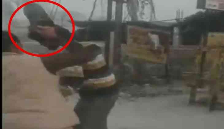 Lady cop thrashes man for 'harassing' school girls