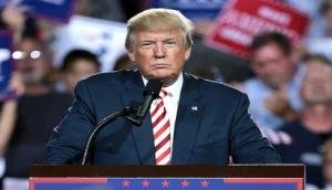 US Prez Trump says he may be free of COVID-19, awaiting new test results