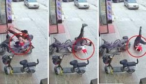 Caught on Camera: Father does everything to keep baby safe