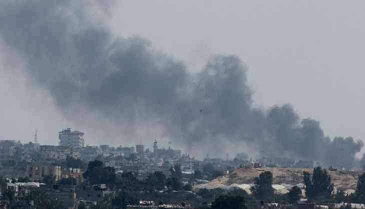 Smoke rises following Israeli strikes during an Israeli military operation in Rafah